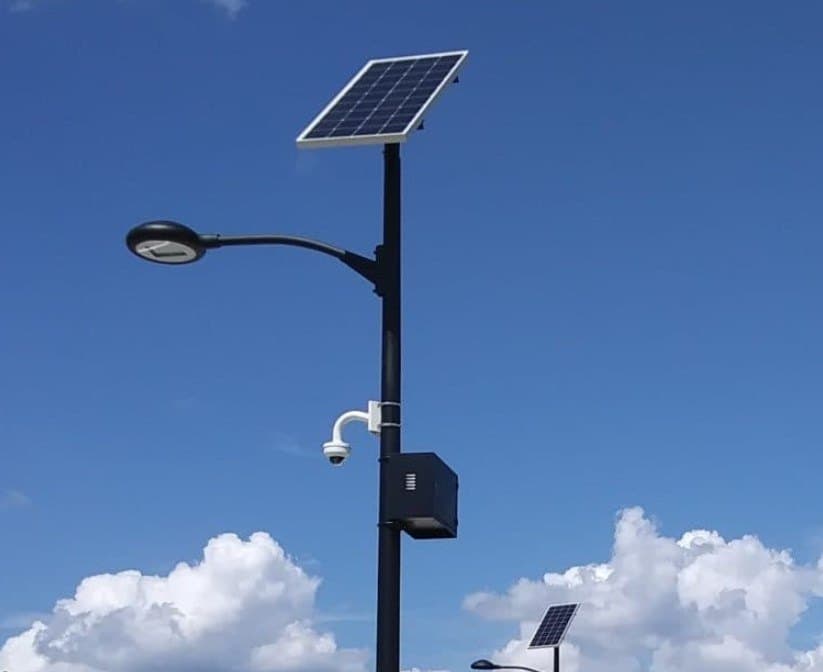 Close-up of a solar panel connected to an LED light fixture